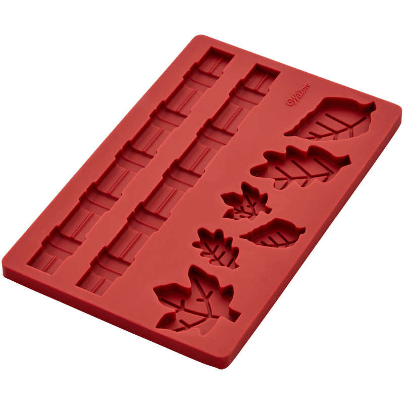 https://www.kitchenboutique.ca/cdn/shop/products/2103-0-0347-Wilton-Border-and-Fall-Leaf-Silicone-Pie-Crust-Mold-8-Cavity-A2_1400x.jpg?v=1664553119